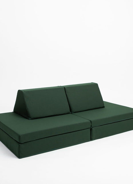 Multifunctionele Monboxy Montessori speelbank in bankopstelling met twee rugkussens – stijlvol en kindvriendelijk ingericht.