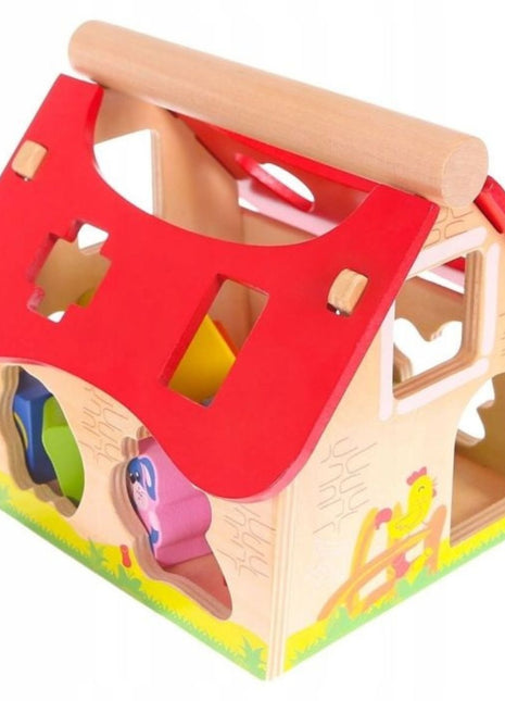 Gerardo’s Toys Houten Boerderijtje met rood dak en zichtbare vormenopeningen en dierfiguren.