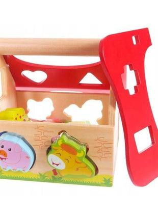 Gerardo’s Toys Houten Boerderijtje met rood verwijderbaar dak en zichtbare dierenvormen.