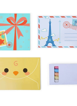 Gerardo’s Toys houten brievenbus set met bedrukt briefpapier en kleurrijke enveloppen.