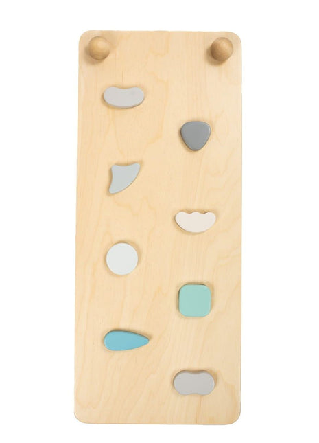 Detail van hellingsbaan voor Pikler pastel met gekleurde klimgrepen op houten plank