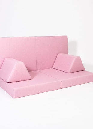 Roze Monboxy Activiteitenspeelbank met hoge rugleuning en driehoekige armleuningen in studio-opstelling.
