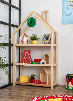 Montessori Huisvormige Plankenkast met rode decoratie en planten in speelhoek met fotolijstjes.