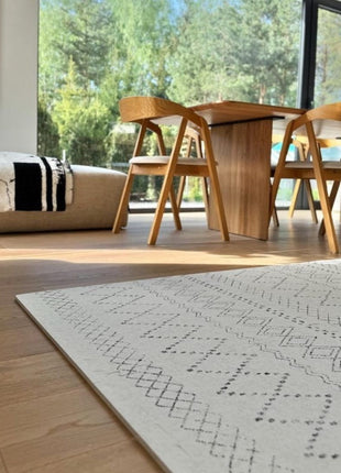 OLYA KIDS Boho Classic schuimpuzzelmat in eetkamer met houten tafel en stoelen.