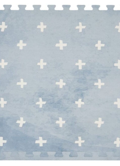 Enkele puzzeltegel van de OLYA KIDS Cross Azure speelmat met wit kruispatroon op lichtblauwe achtergrond.