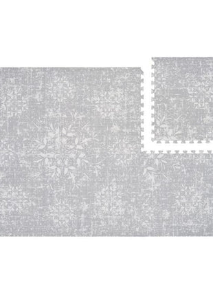 OLYA KIDS Vintage Grijs speelmat met losse en samengevoegde puzzeltegels.