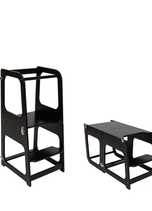 Zwarte Transformeerbare Keukentoren in toren- en tafelstand op witte achtergrond.