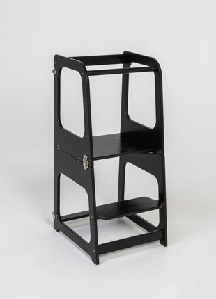 Transformeerbare Keukentoren in zwart in torenstand op witte achtergrond.