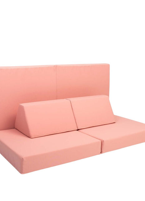 Zalmroze Montessori speelbank van Monboxy in neutrale bankopstelling op witte achtergrond – toont veelzijdigheid van het ontwerp.